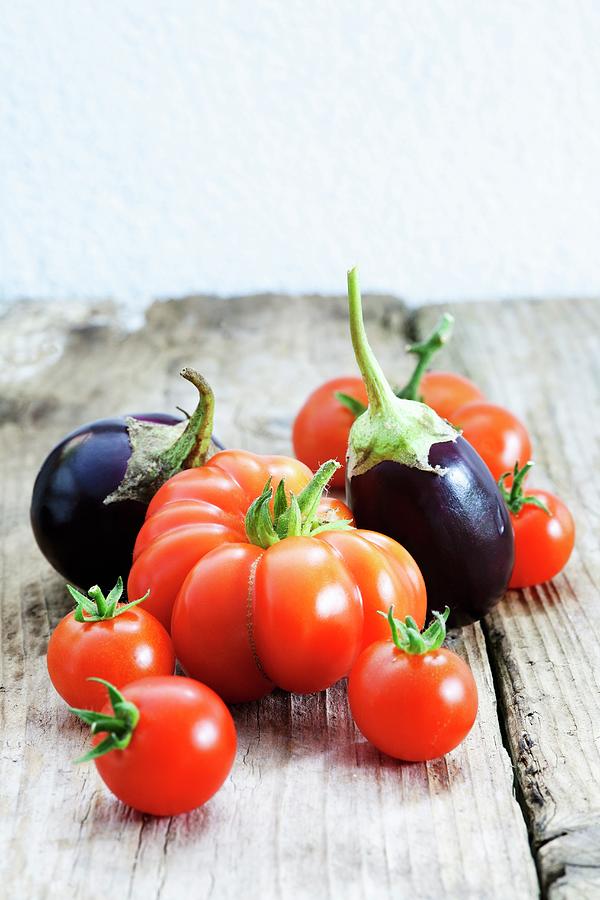 Tomatoes And Aubergines Photograph by Victoria Firmston