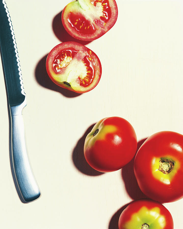 Tomatoes With Knife, Vegetables, Food, Nutrition Photograph by R. Striegl