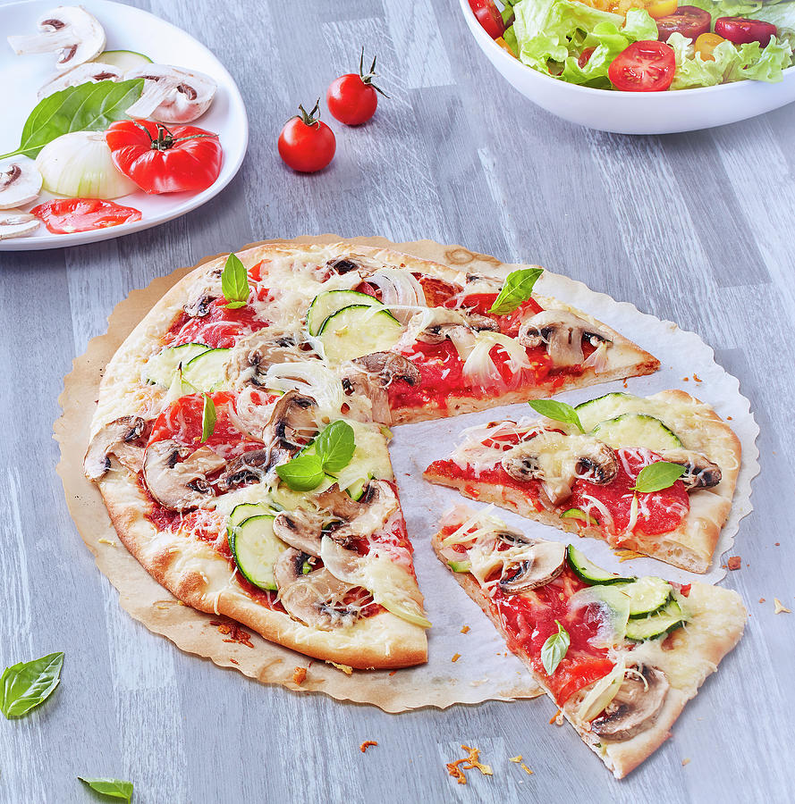 Tomato,mushroom And Courgette Pizza Photograph by Scuiz In