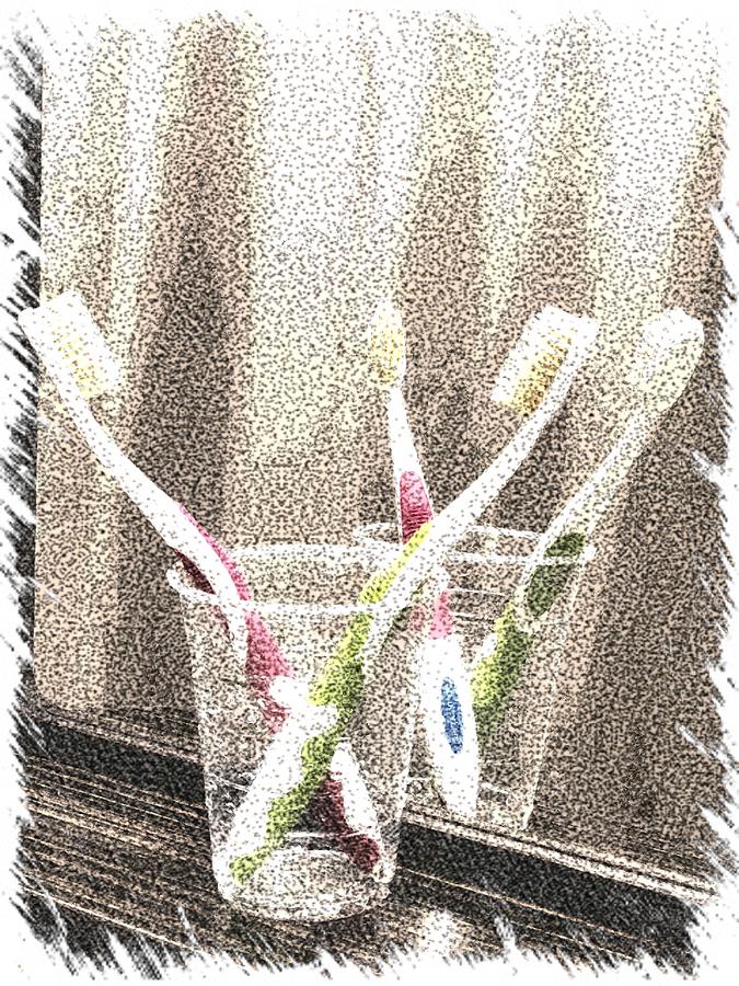Toothbrushes in a motel bathroom by Tatiana Travelways Toothbrushes in a motel bathroom by Tatiana Travelways