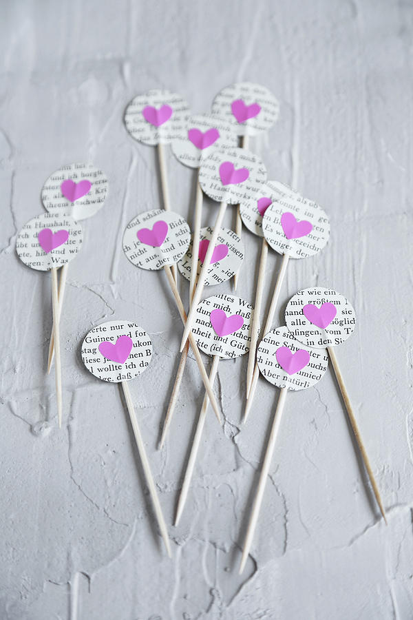 Toothpicks Decorated With Circles Of Book Pages And Pink Paper Hearts Photograph by Thordis R�ggeberg