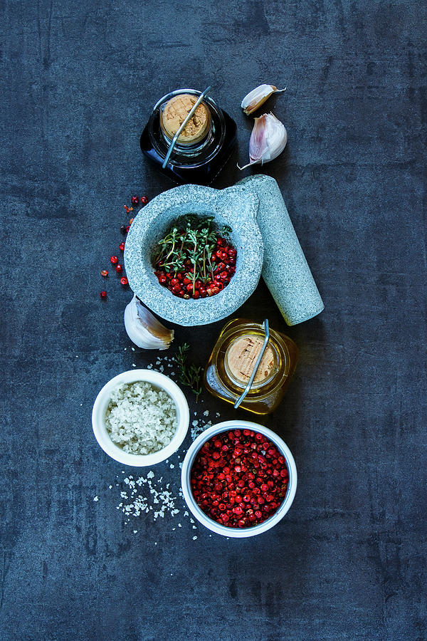 Top View Of Olive Oil, Balsamic Vinegar, Mortar And Pestle With Various Colorful Spices On Dark Grunge Background Photograph by Yuliya Gontar