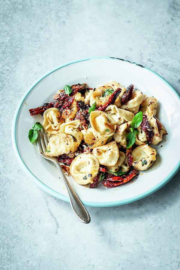 Tortellini Aglio E Olio With Dried Tomatoes Photograph by Simone Neufing