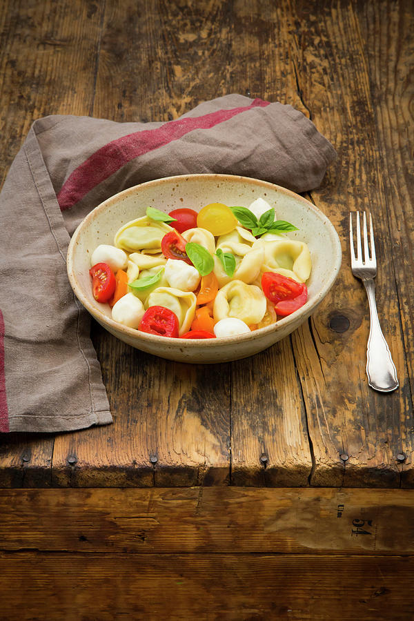 Tortellini Salad With Tomatoes, Mozzarella And Basil Photograph by Larissa Veronesi