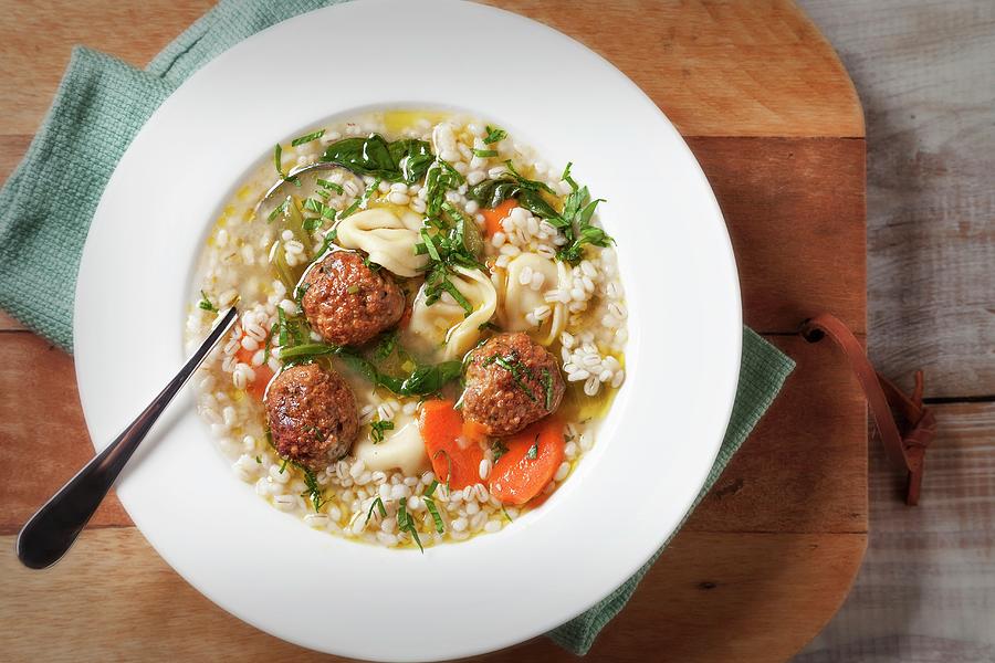 Tortellini Soup With Turkey Meatballs, Spinach, Carrots, And Barley Photograph by George Crudo