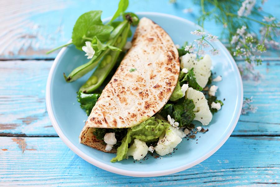 Tortilla With Cauliflower, Fava Beans And Avocado Photograph by Boguslaw Bialy