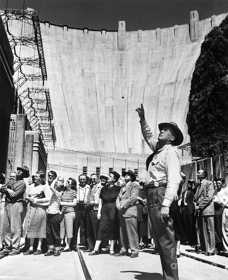 Tour Guide And Group At Hoover Dam Photograph by Bettmann