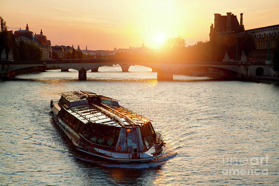 Tourist Boat On Seine River At Sunset Photograph by Sylvain Sonnet