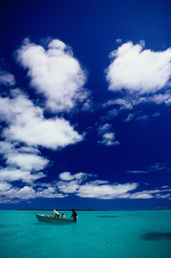 Tourists In Boat On Aitutaki Photograph by Dallas Stribley