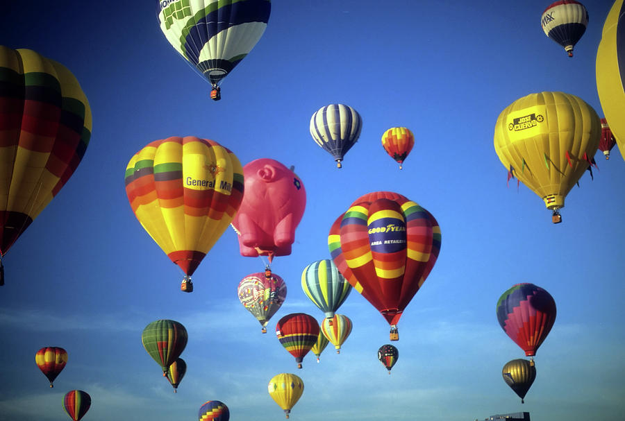 Tourists ride hot air ballons   Photograph by Steve Estvanik