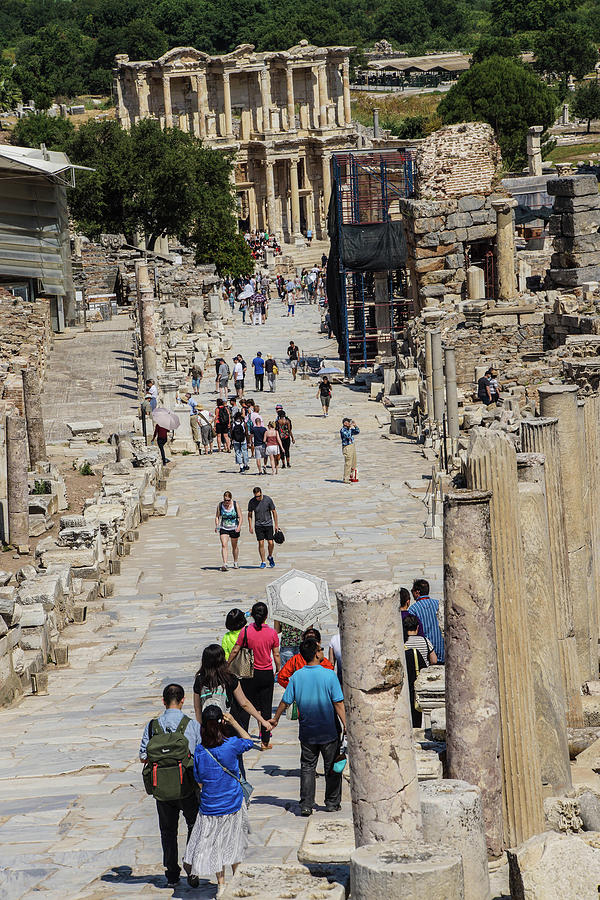 Tourists walk to the Library of Celsus  Photograph by Steve Estvanik
