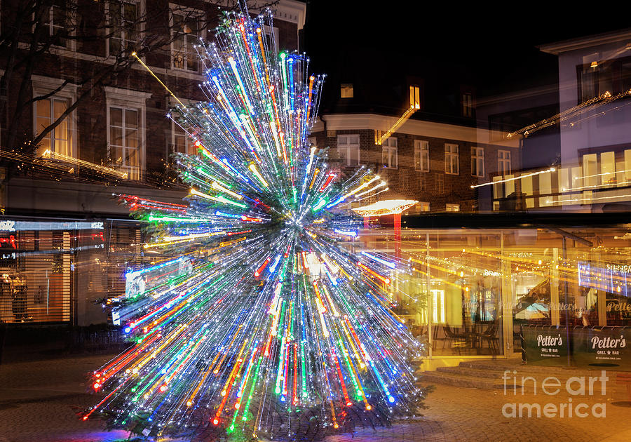 Town christmas tree light trails Photograph by Sophie McAulay
