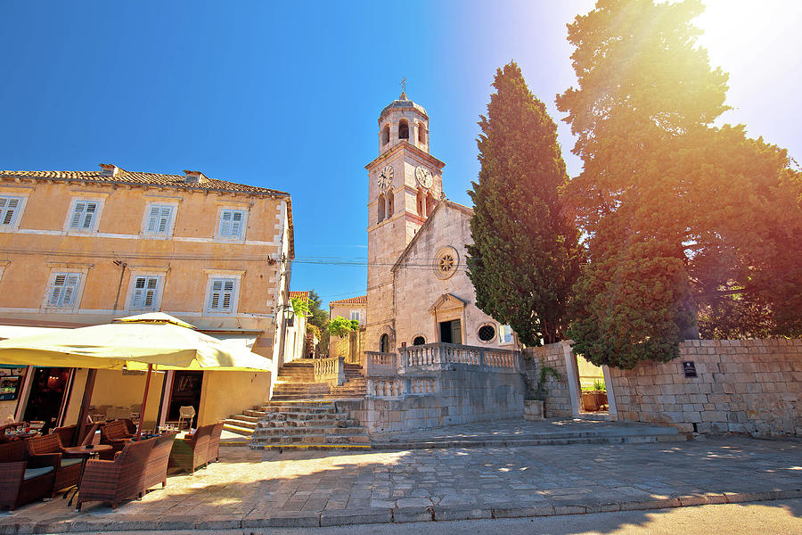 Town of Cavtat stone church sun haze view Photograph by Brch Photography