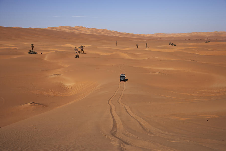 Toyota Landcruiser In Lane In The Dunes, Lybia, Africa Photograph by Stefan Schtz