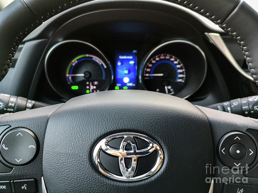 Toyota Steering Wheel Controls And Car Dashboard Photograph by Luca Lorenzelli