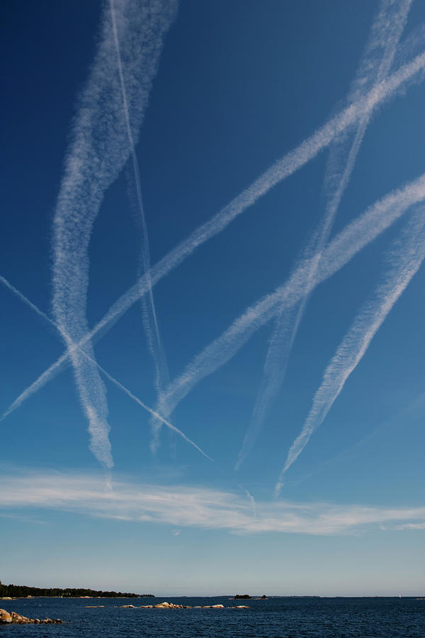 Traces From Airplanes In The Sky Photograph by Lindewall, Ingemar