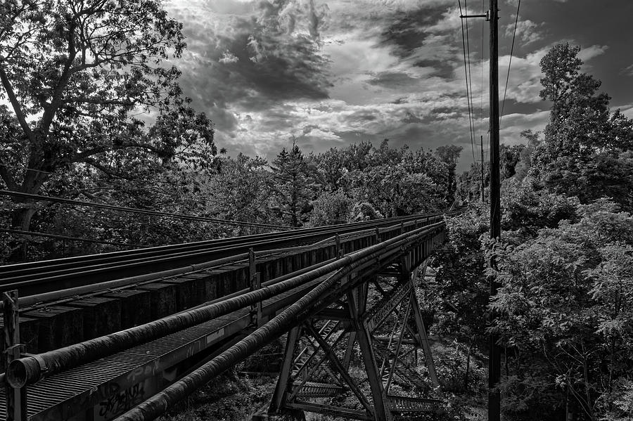 Tracks over the Nissequogue River Photograph by Steve Gravano