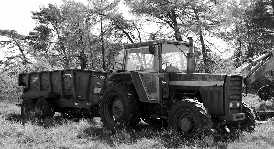 Tractor and the trail Photograph by Lukasz Ryszka