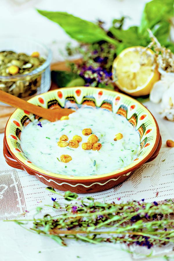 Traditional Bulgarian Tarator Soup With Herbs, Lemons And Salted Corn Photograph by Elizaveta Dogadaeva