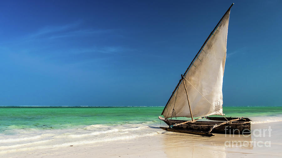 Traditional fishing boat on the beach Photograph by Lyl Dil Creations