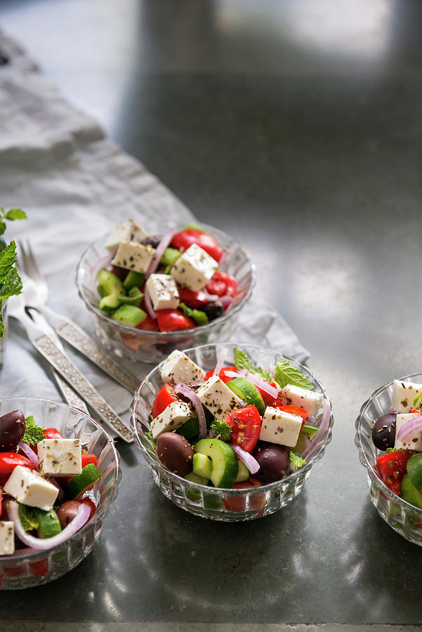 Traditional Greek Salad In Small Glass Bowls Photograph by Sarka Babicka
