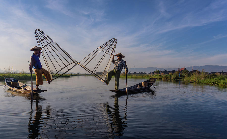 traditional Intha fishermen raising nets Photograph by Ann Moore