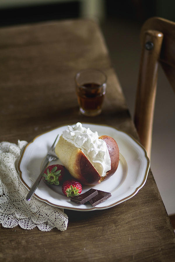 Traditional Neapolitan Rum Baba With Whipped Cream Photograph by Alicia Maas Aldaya
