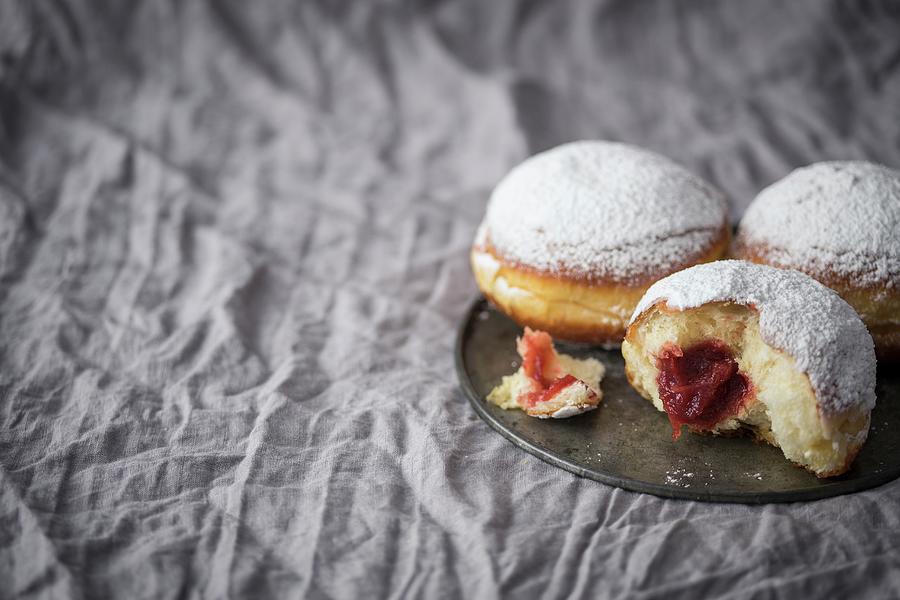 Traditional Polish Donuts Filled With Marmalade And Dusted With Icing Sugar Photograph by Malgorzata Laniak