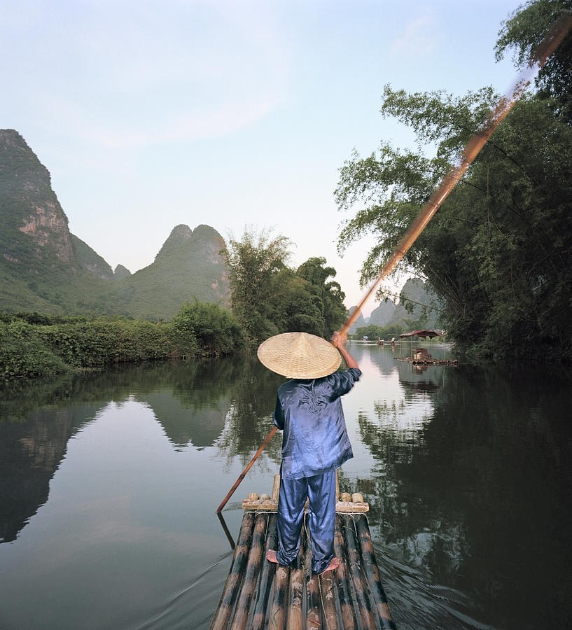 Traditional Raft On Yulong River Photograph by Martin Puddy
