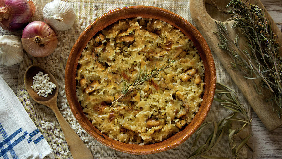 Traditional Spanish Arroz Al Horno. Rice With Chicken Cooked In A Oven Photograph by Albert Gonzalez