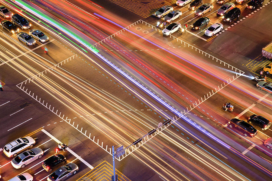 Traffic Trails Of Intersection Photograph by Sungjin Kim
