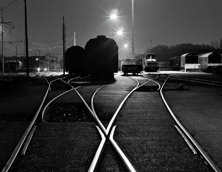 Train And Rail Shapes In The Night Photograph by Nicola Filardi