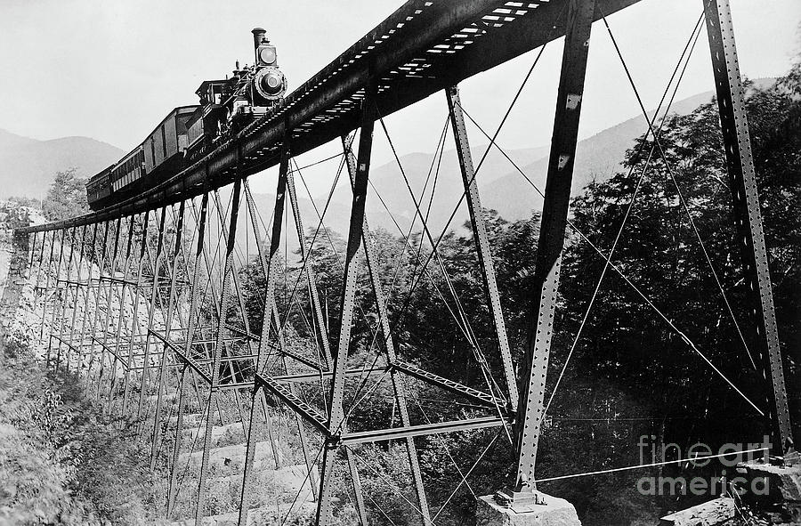 Train Crossing Railroad Trestle Photograph by Bettmann