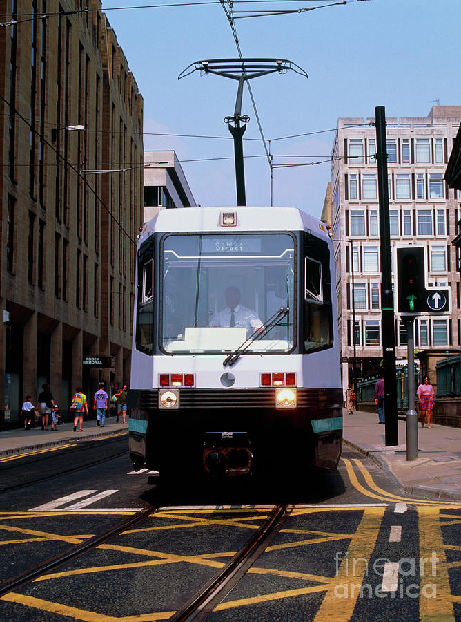 Tram In Manchester Street Photograph by Martin Bond/science Photo Library