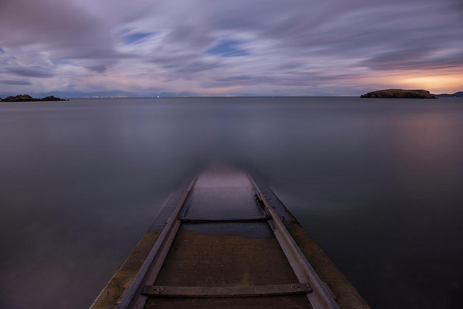 Pier Photograph - Tranquil View Of Pier By Vancouver Island Against Cloudy Sky by Cavan Images
