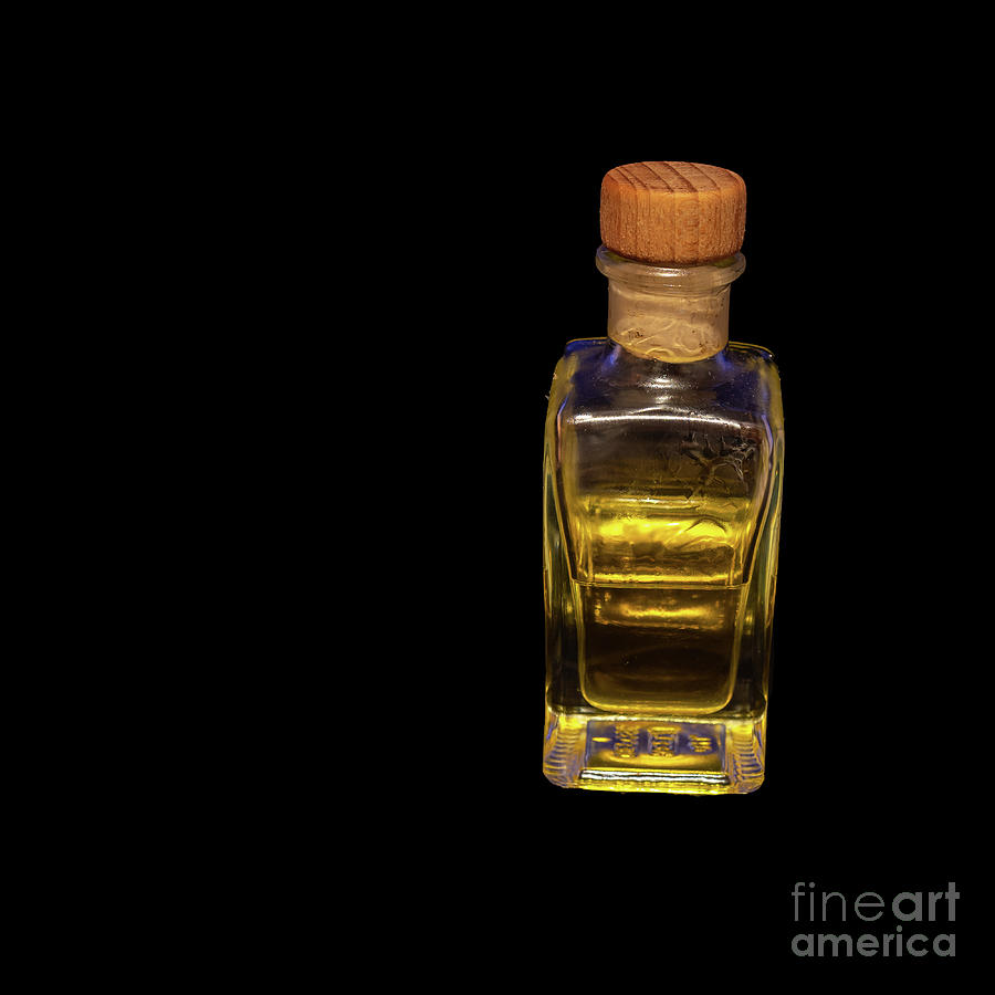 Download Transparent Rectangular Glass Bottle With A Cork Stopper Half Filled With A Luminous Yellow Liquid Exposed Against A Black Background Photograph By Frank Heinz PSD Mockup Templates