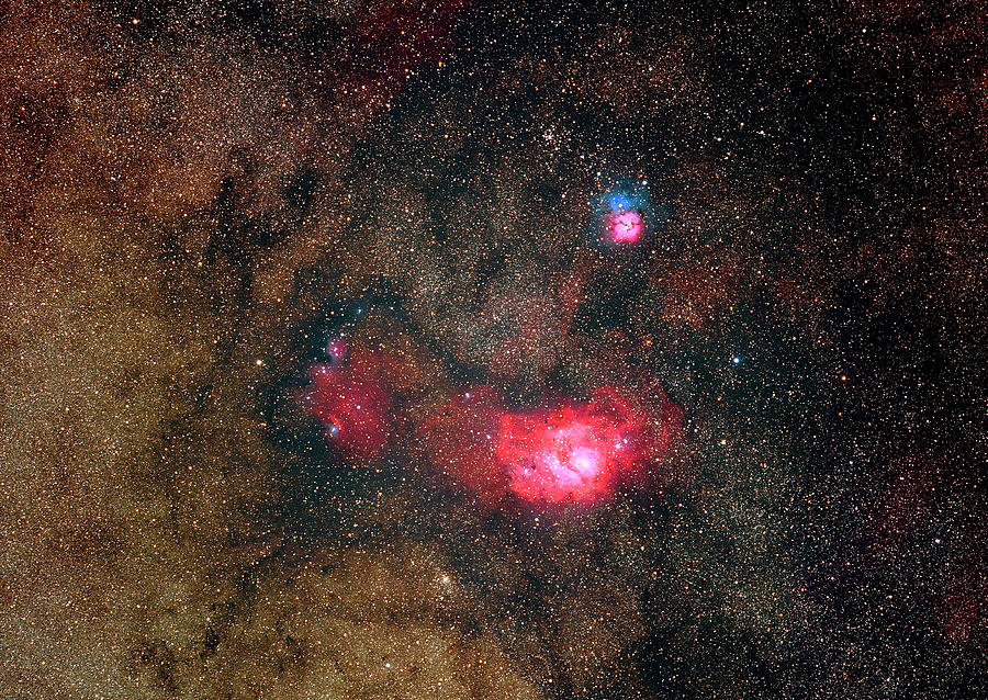 Trifid Nebulae And Lagoon Nebula Photograph by Imagenavi