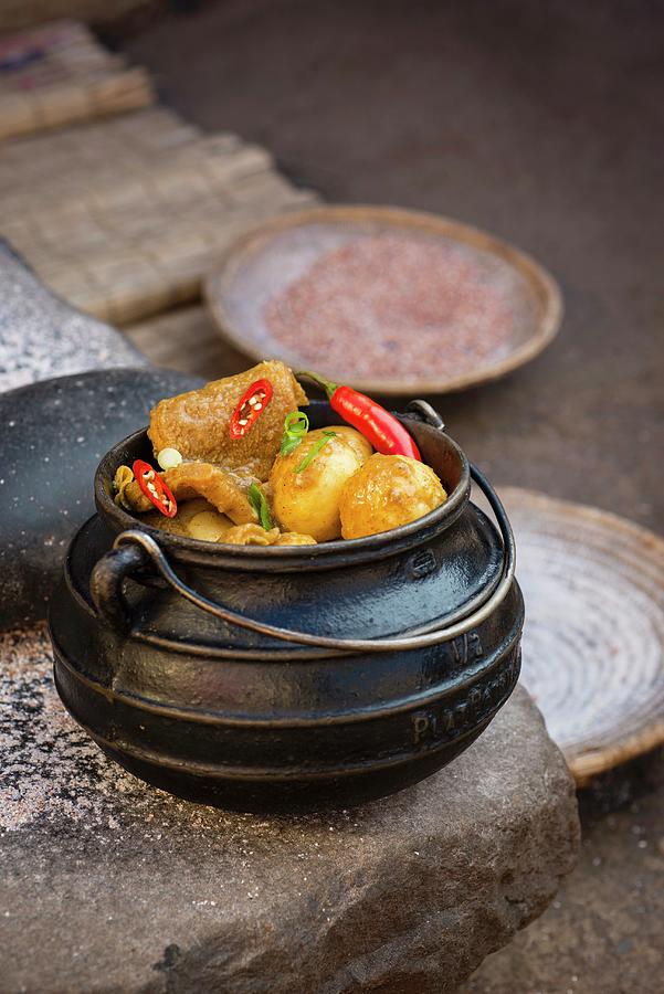 Tripe In Chilli Sauce With Yeast Dumplings Served In A Cauldron ...