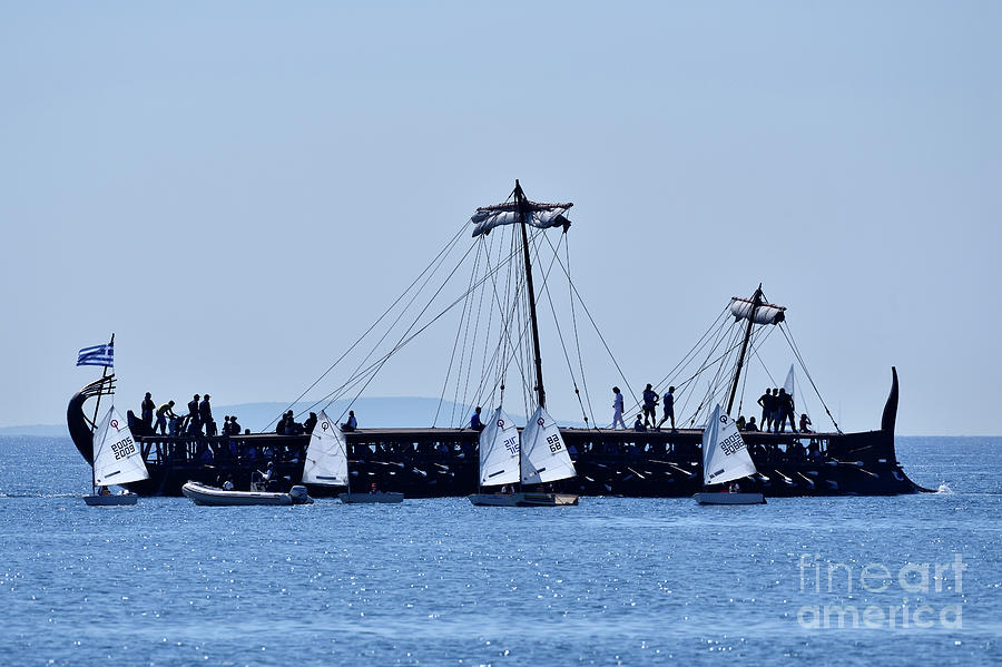 Trireme Olympias and Optimist sailing boats Photograph by George Atsametakis