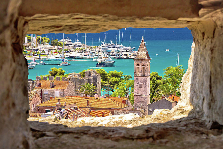 Trogir church and turquoise waterfront view through stone window Photograph by Brch Photography