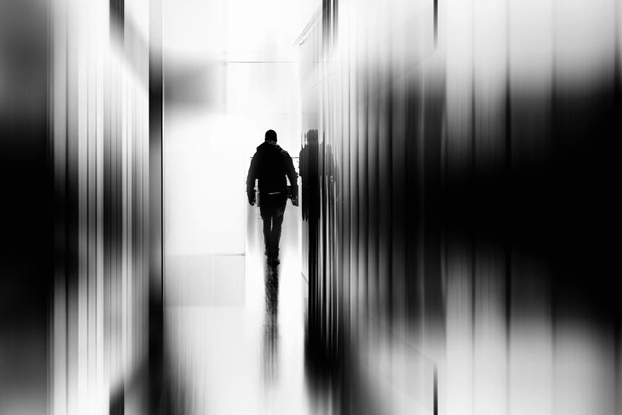Black And White Photograph - Troubled Stroll by Paulo Abrantes