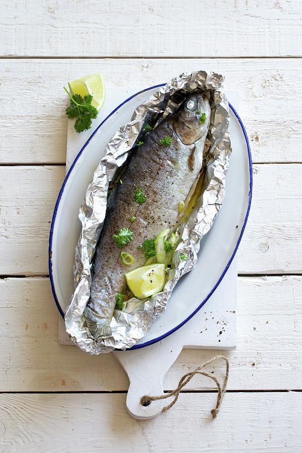 Trout Cooked In Foil Photograph by Fotos Mit Geschmack