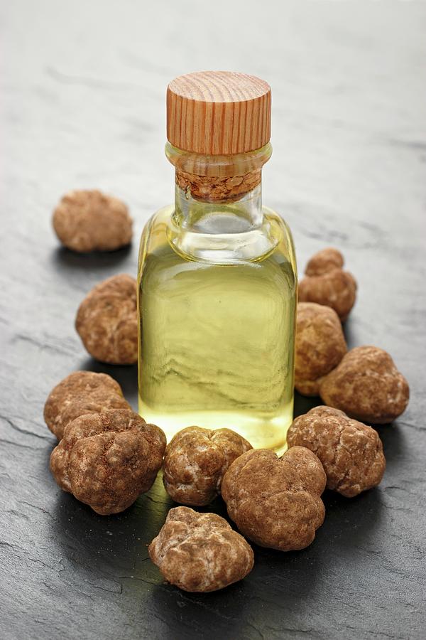Truffle Oil And Fresh Truffles Photograph by Petr Gross