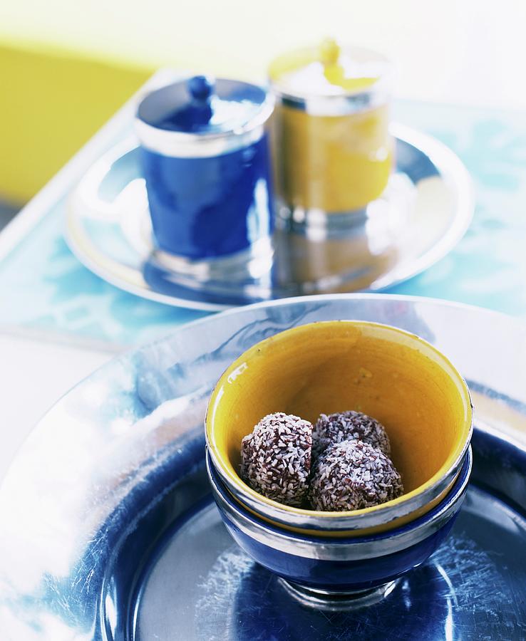 Truffle Pralines In Ceramic Bowls Photograph by Matteo Manduzio