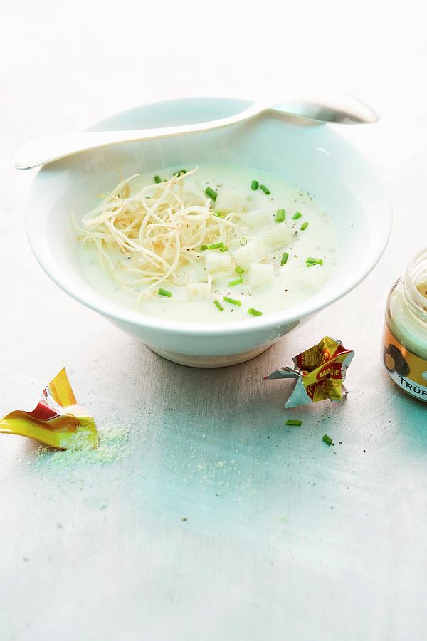 Truffled Cream Of Potato Soup With Celery Photograph by Michael Wissing