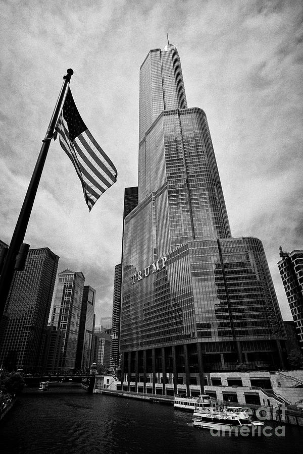 Chicago Photograph - trump international hotel and tower with us flag flying and with the chicago river downtown Chicago  by Joe Fox