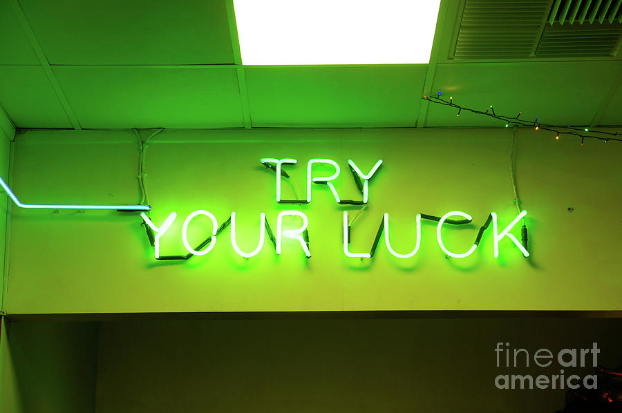 Try your luck sign Photograph by Tom Gowanlock