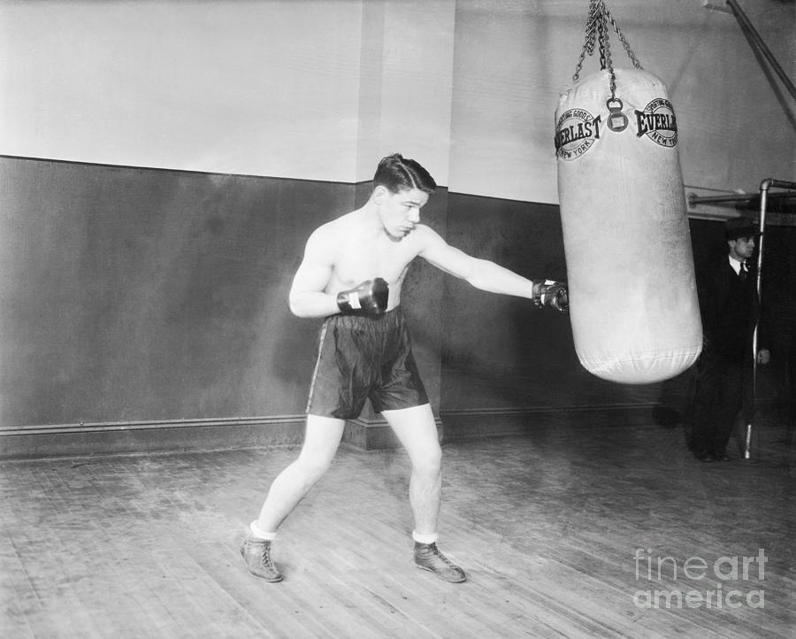 Tuffy Griffith Working The Weight Bag Photograph by Bettmann