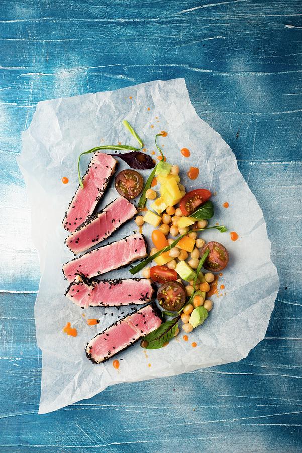 Tuna Fish Coated In Sesame Seeds With A Spicy Vegetable Salsa Photograph by Great Stock!