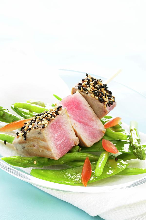 Tuna Skewer On A Bed Of Steamed Vegetables Photograph by Pizzi, Alessandra